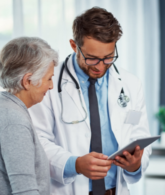 Physician meets with a patient