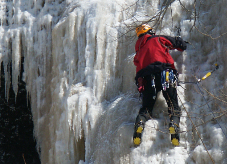 person climbing ice wall